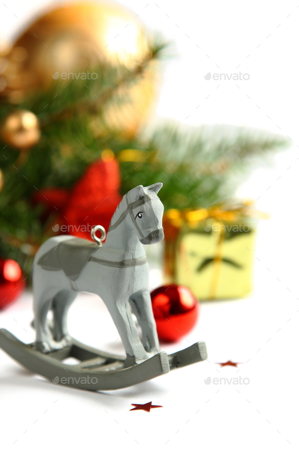Christmas composition with wooden toy rocking horse - Stock Photo - Images