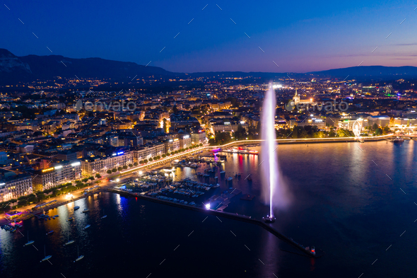 Aerial  night view of Geneva city water fountain in Switzerland - Stock Photo - Images