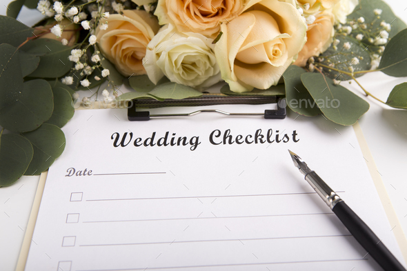 Wedding checklist is ready to be full of items on white sheet