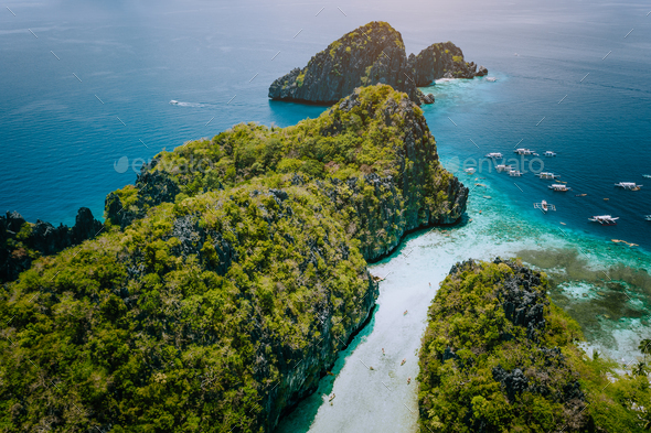 Aerial drone view of entrance to shallow tropical Big and Small Lagoon explored inside by tourist on - Stock Photo - Images