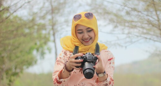 The girl focus on her camera