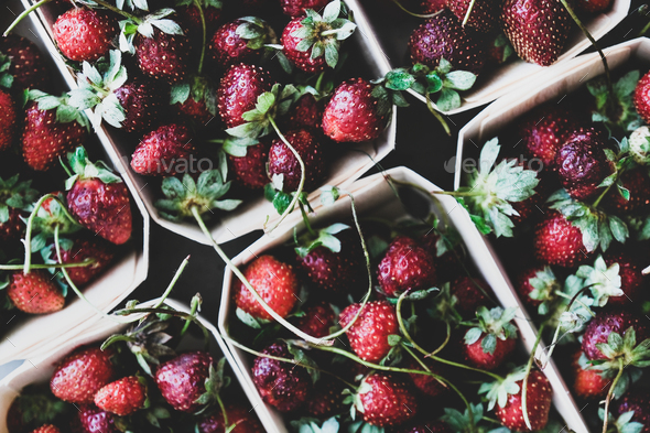 Food texture, background, wallpaper with fresh garden strawberries in boxes - Stock Photo - Images