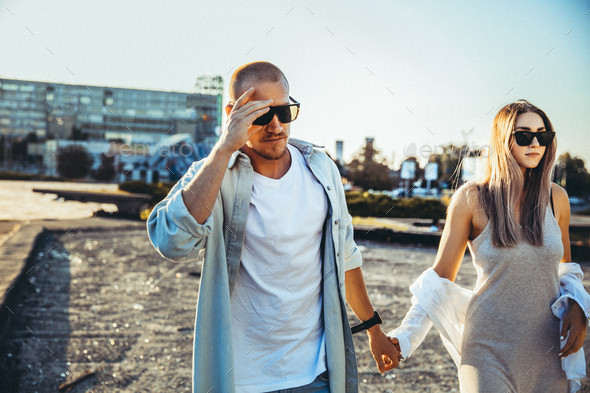 Tanned young caucasian couple, modern lovestory in film grain effect - Stock Photo - Images