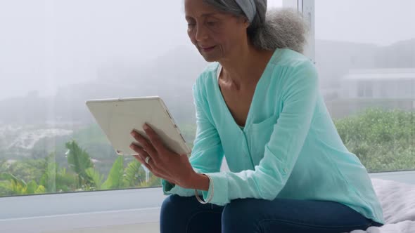 Mature woman at home alt