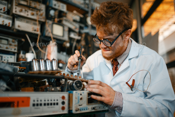 Strange scientist soldering chips, test in lab