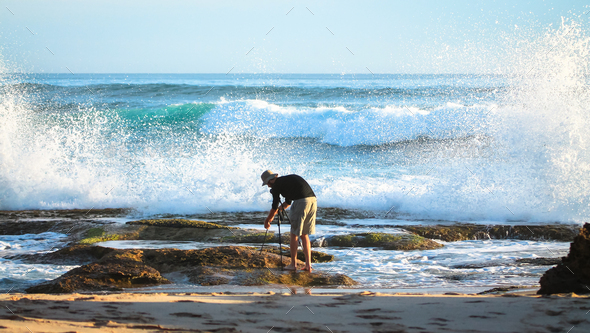 Photographer at the Ocean in Victoria, Australia - Stock Photo - Images