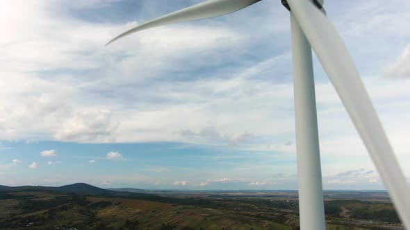 Camera Flight Over Landscape with Power Plant, Aerial View To Wind Turbine, Sustainable Electricity alt