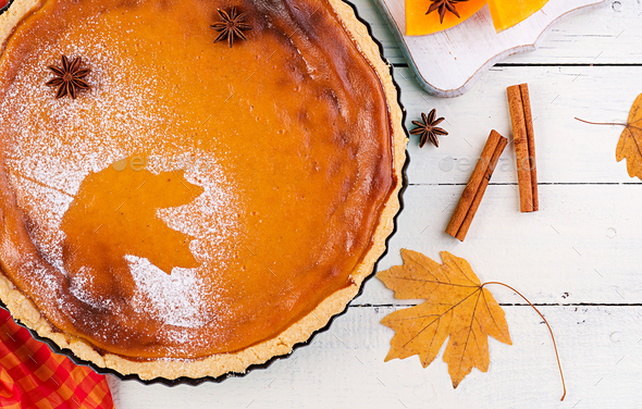 American homemade pumpkin pie with cinnamon and nutmeg, pumpkin - Stock Photo - Images