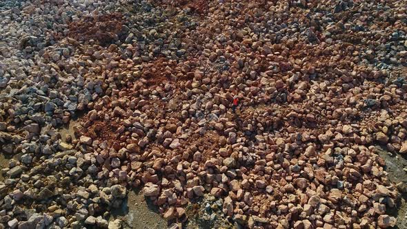 Worker Walking on Construction Site alt