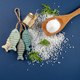 Fine and coarse salt with decor on a dark blue background. - PhotoDune Item for Sale