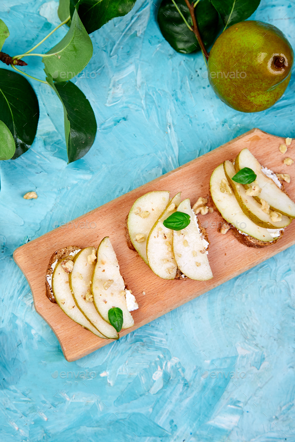 Bruschetta and Crostini with pear, ricotta cheese, honey. - Stock Photo - Images