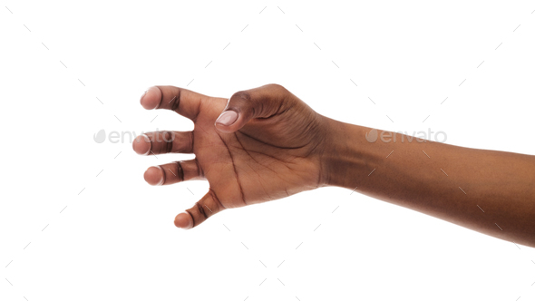 Afro woman&#39;s hand grabbing something invisible on white background - Stock Photo - Images