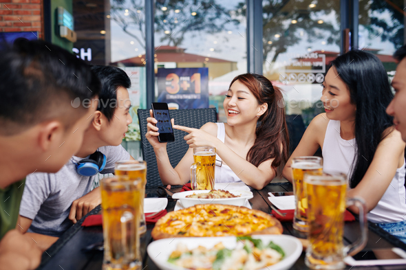 Friends doing online shopping - Stock Photo - Images