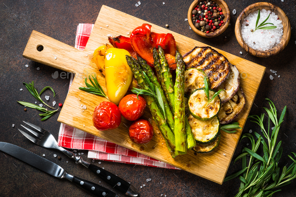 Grilled vegetables - zucchini, paprika, eggplant, asparagus and tomatoes - Stock Photo - Images