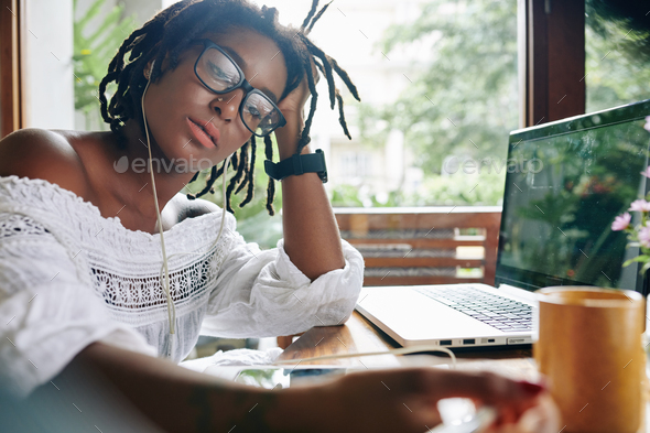 Woman studying at home - Stock Photo - Images