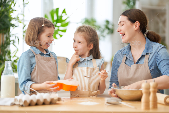 family are preparing bakery together - Stock Photo - Images