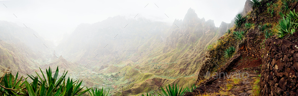 Panorama of Xo-Xo valley surrounded by harsh mountain peaks. Steep walk path covered by yucca plants - Stock Photo - Images