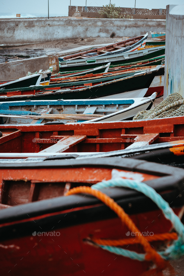 Colored local fishing boats along the old fishing shore. Ponta do Sol Santo  Antao Cape Verde Stock Photo by Igor_Tichonow