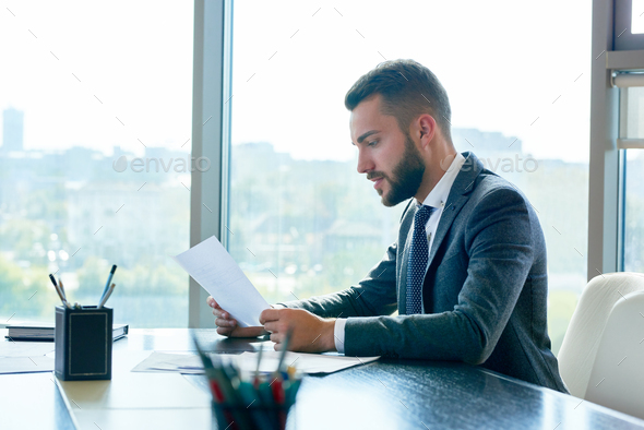 Wrapped up in Paperwork - Stock Photo - Images