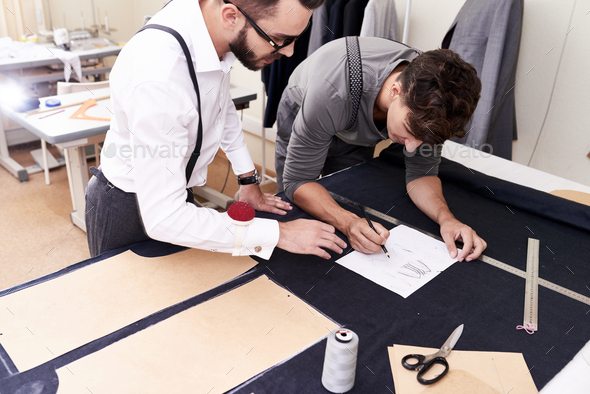 Two Tailors Working in Atelier - Stock Photo - Images