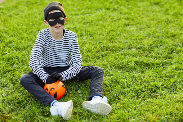 Little Boy Wearing Halloween Costume Outdoors - Stock Photo - Images