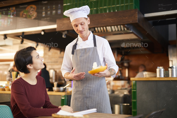 Restaurant Chef Talking to Guest