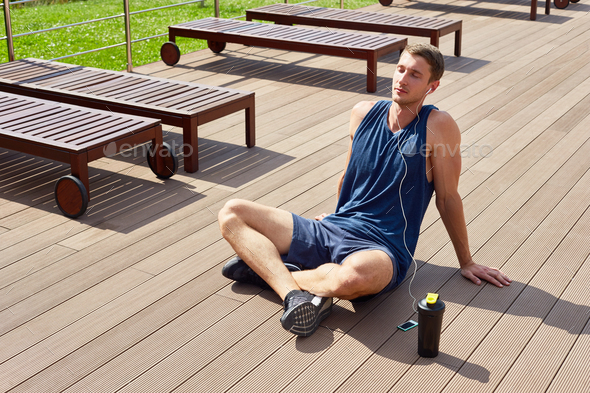 Sportsman Relaxing after Working Out - Stock Photo - Images