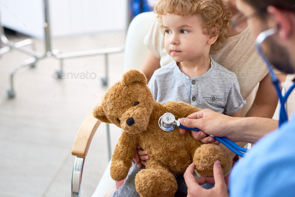 Little Boy Visiting Doctor - Stock Photo - Images