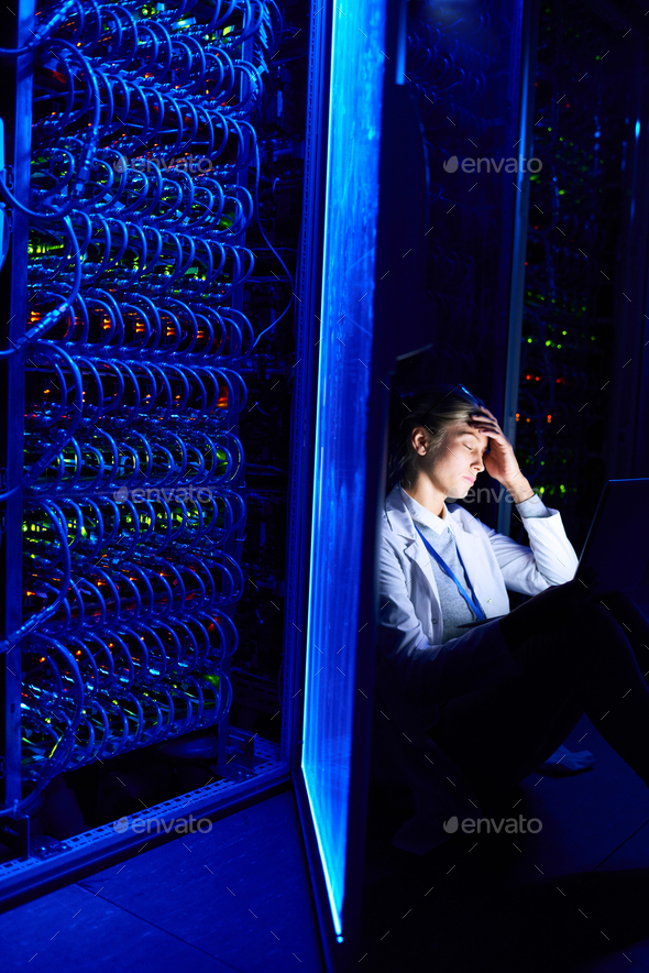 Female Scientist Working at Night - Stock Photo - Images