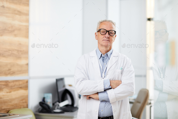 Confident Senior Doctor - Stock Photo - Images