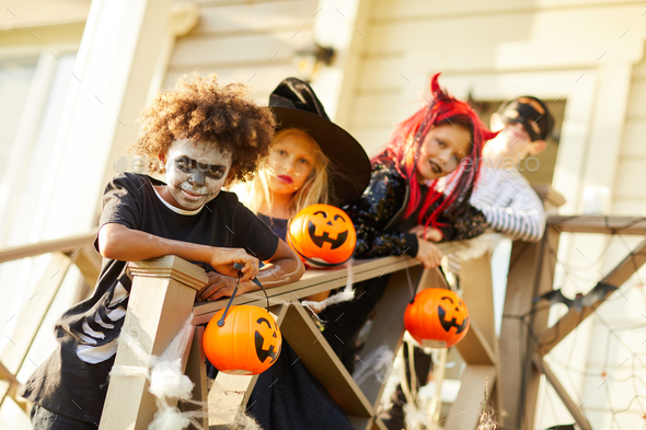Friends Posing Outdoors on Halloween - Stock Photo - Images