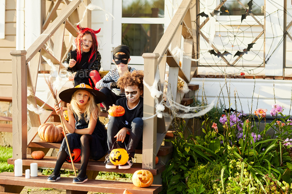 Children in Costumes Posing on Halloween - Stock Photo - Images