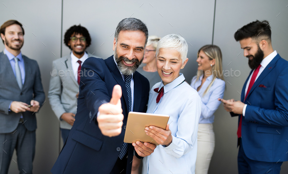 Successful team leader and business owner leading informal in-house business meeting - Stock Photo - Images