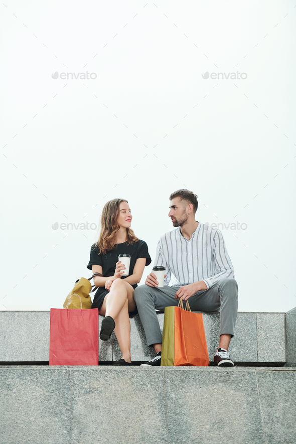 Young couple discussing shopping