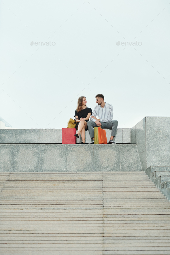 Couple resting after shopping