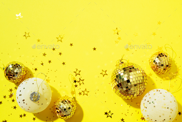Christmas composition. Flat lay, top view. Disco ball bauble, star sparkles. Minimal New year party - Stock Photo - Images