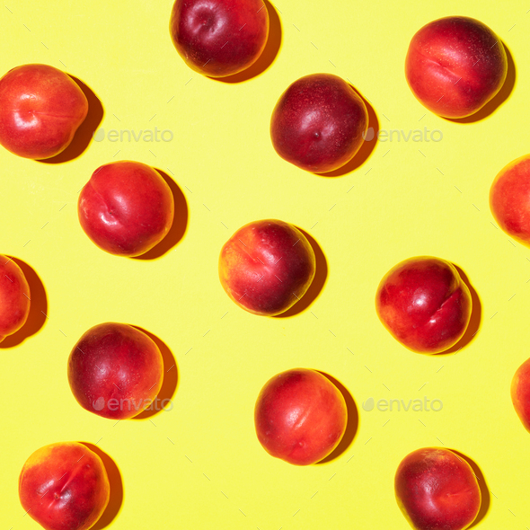 Nectarines pattern on yellow background. Frame made of fresh fruits. Flat lay, top view, copy space - Stock Photo - Images