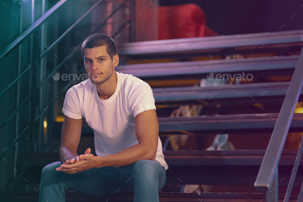 Close-up portrait of attractive male model. Young handsome man in a bar - Stock Photo - Images