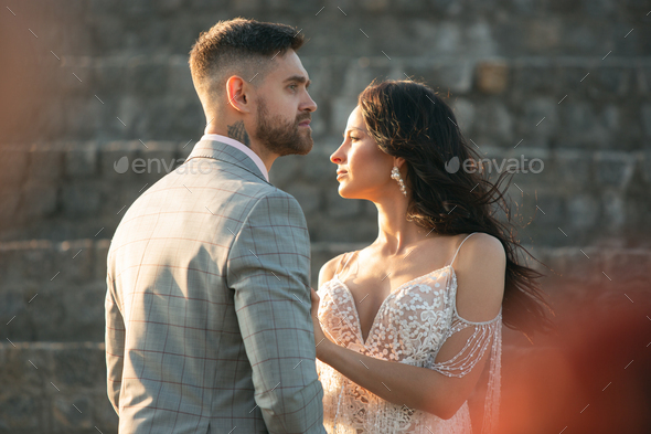 Caucasian romantic young couple celebrating their marriage in city - Stock Photo - Images