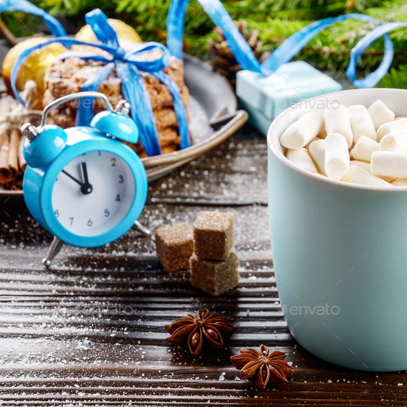 Christmas background of blue hot chocolate mug with marshmallows - Stock Photo - Images