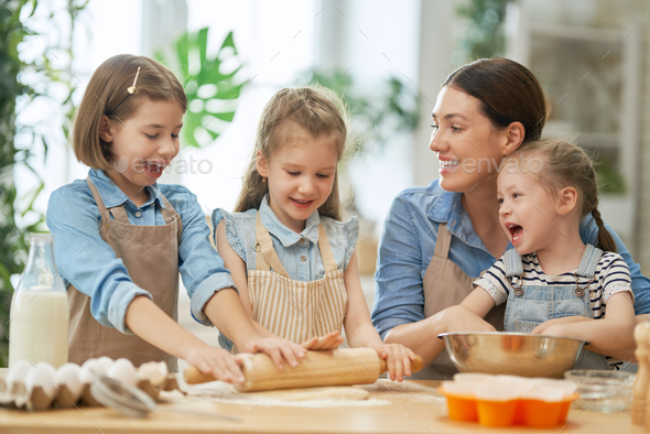 family are preparing bakery together - Stock Photo - Images