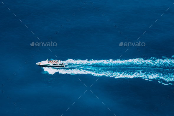 Tourist boat in full speed in open sea, Greece - Stock Photo - Images