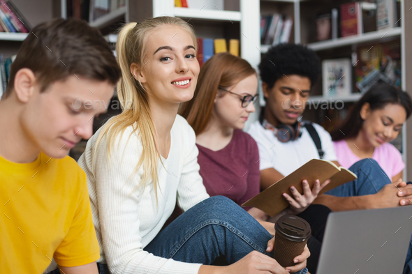 International group of students studying before exams at library - Stock Photo - Images
