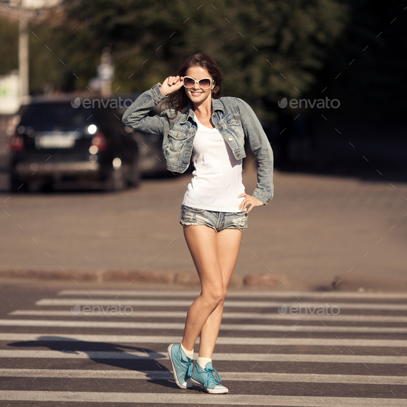 Young Woman Walking On City Street Stock Photo by yuriyzhuravov | PhotoDune