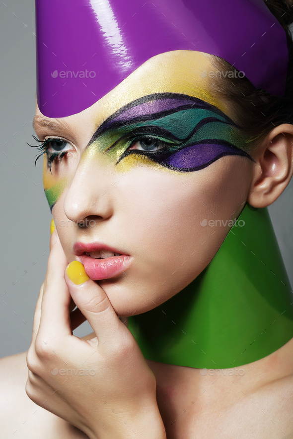 Woman\'s face with theatrical makeup