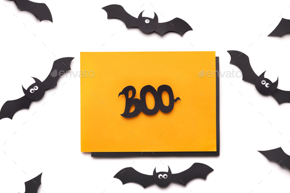 Creative autumn holiday background of paper bats