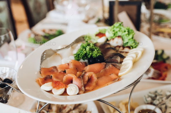 Appetizing fish at banquet. Wedding festive banquet - Stock Photo - Images