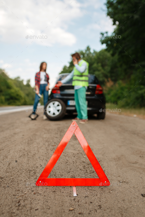 Emergency stop sign, flat tyre, punctured tire - Stock Photo - Images