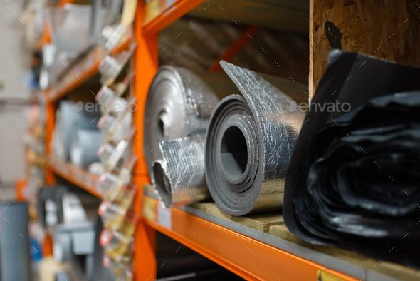 Rolls of thermal insulation in hardware store