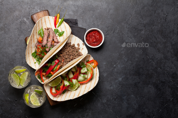 Mexican tacos and caipirinha cocktail - Stock Photo - Images